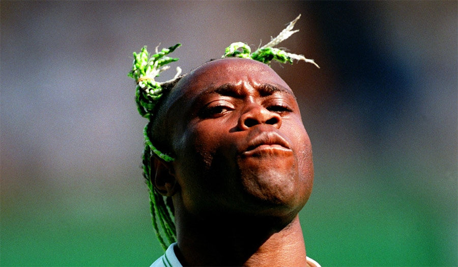 Taribo West green braids hairstyle