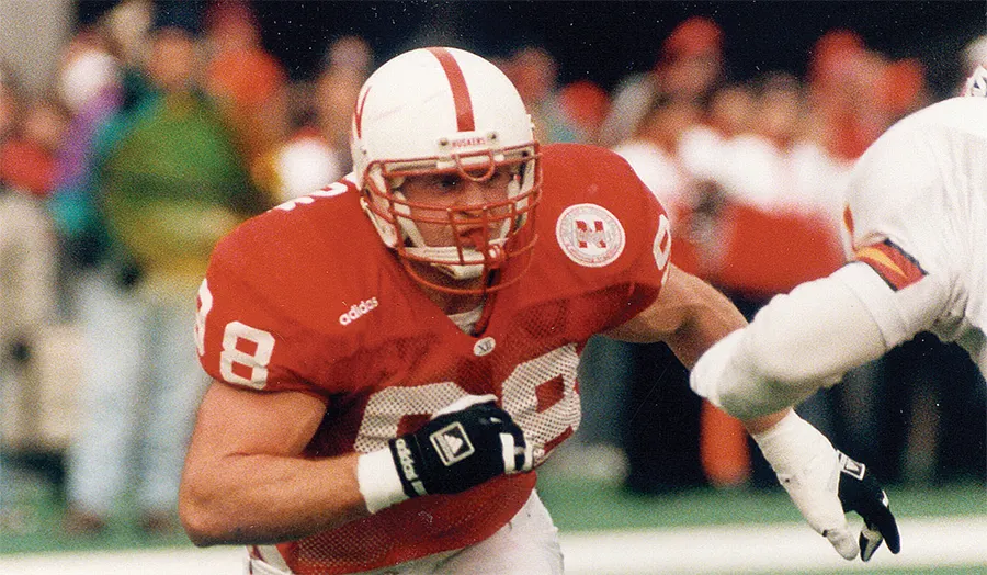 Grant Wistrom Nebraska defensive end rushing the QB